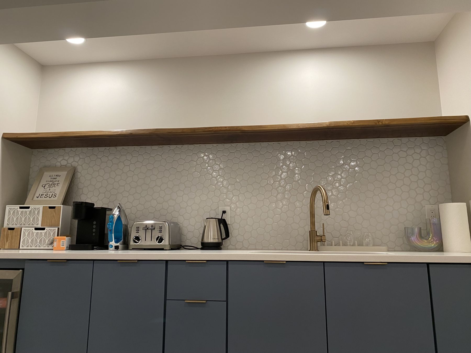 Coffee bar with tile backsplash and a live-edge walnut shelf