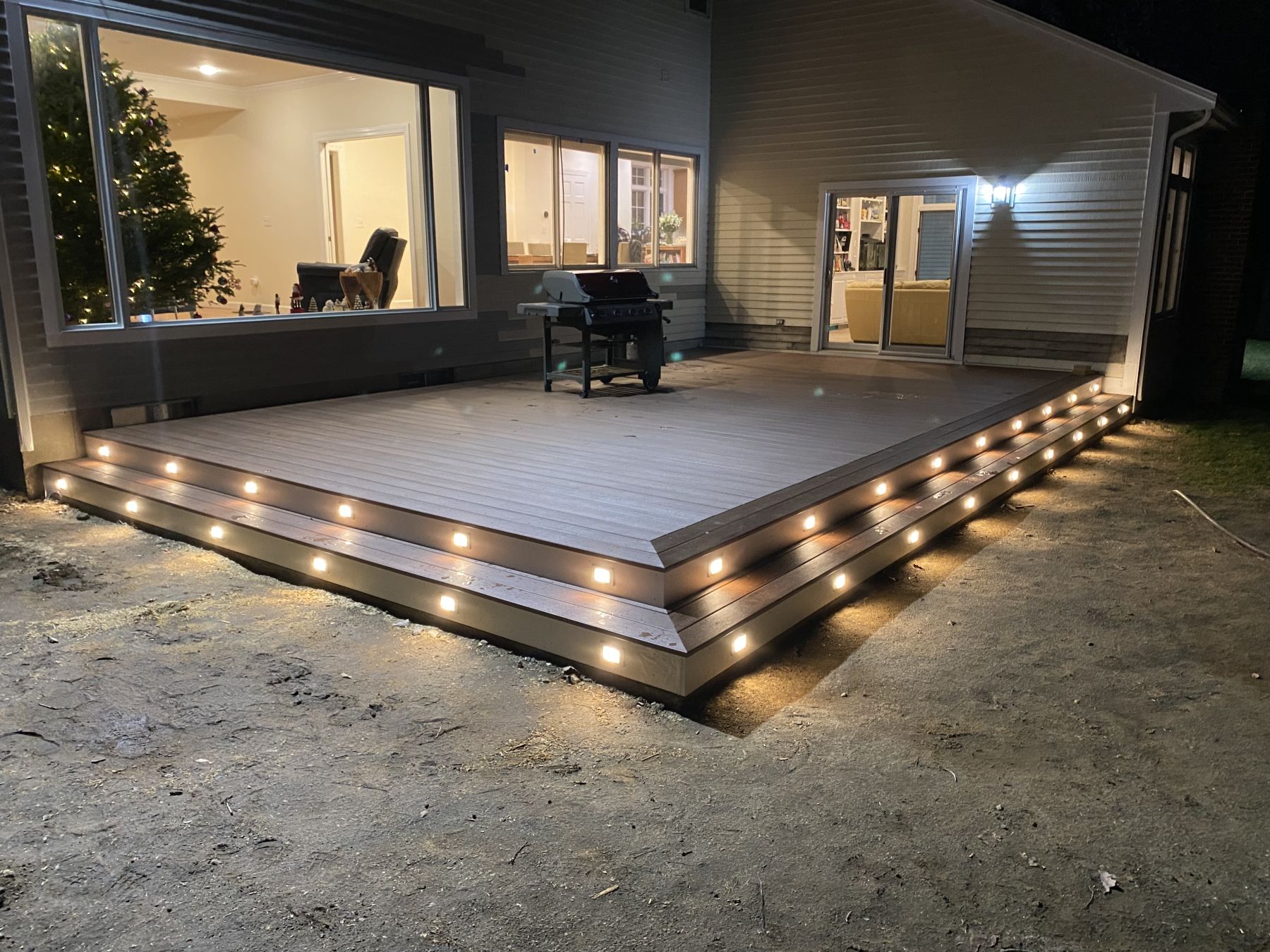 Composite deck with lit risers at night